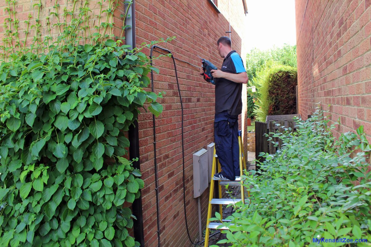 Running the cable up and then through the wall (Image: T. Larkum)