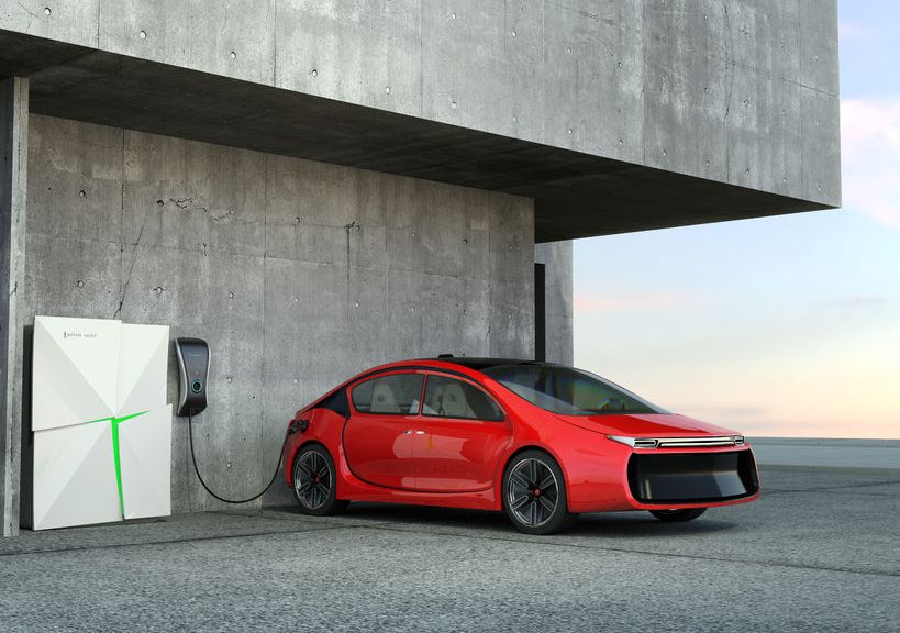 Electric car charging from home battery (Copyright: cheskyw / 123RF Stock Photo)